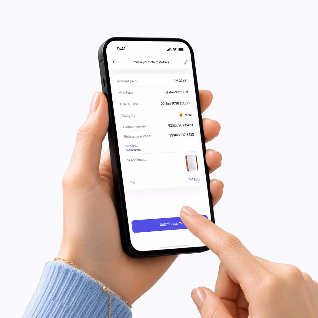 Hand holding phone showing expense claim form for meal at Restaurant Duck with submit button.