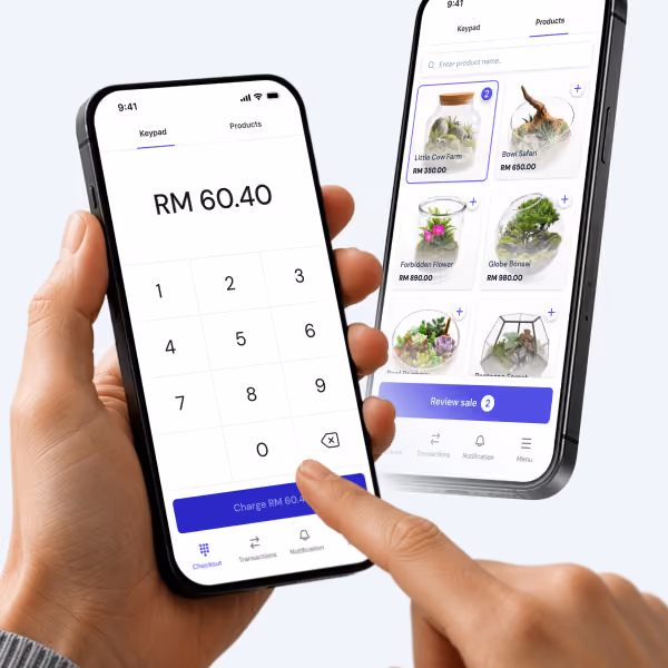 Person holding smartphone showing a payment keypad with RM 60.40 and a products selection screen.